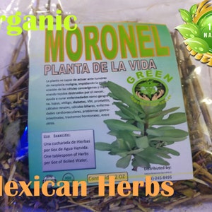 May include: A clear plastic bag filled with dried herbs labeled "Organic Moronel Planta de la Vida Green 100% Natural Mexican Herbs". The label also includes instructions for use and a distributor's contact information.