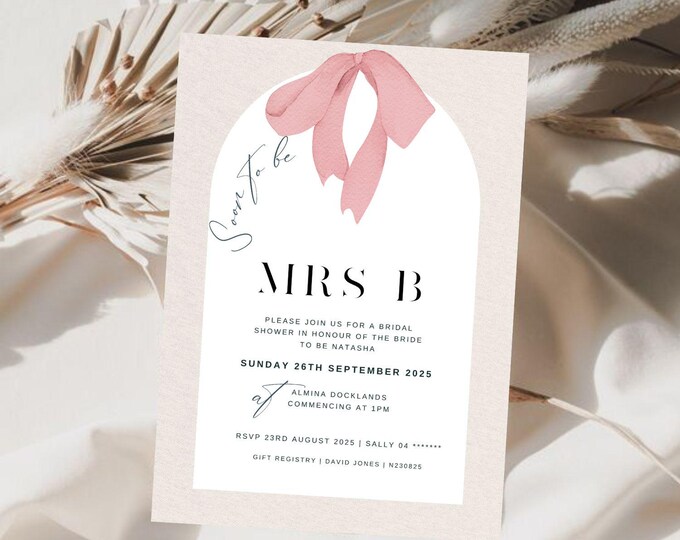 Arch featuring a pink bow Bridal Shower invitation