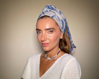 A blue Headband , Snood, Head Scarf, Head Covering