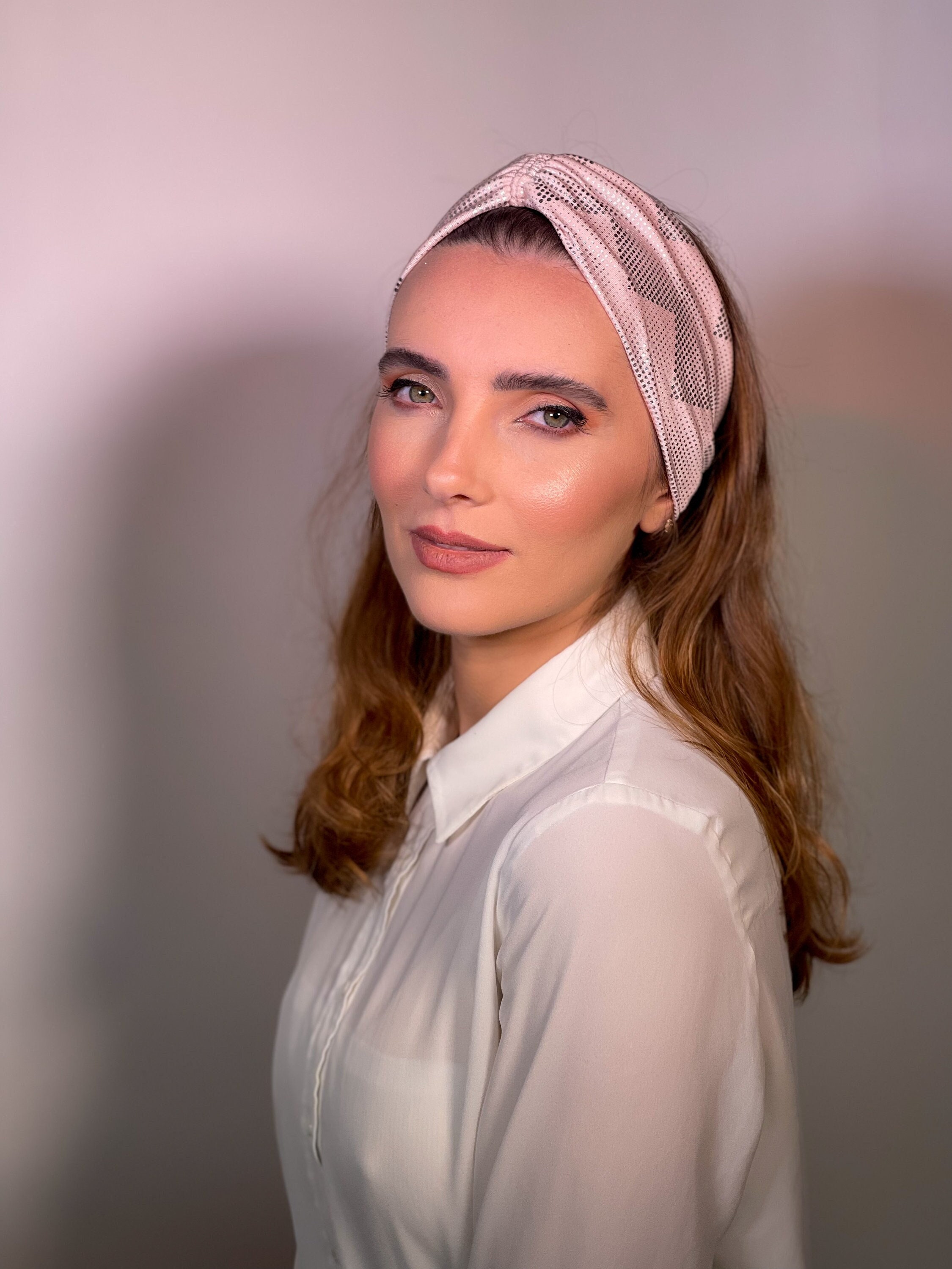 A beautiful pink evening twist accessory
