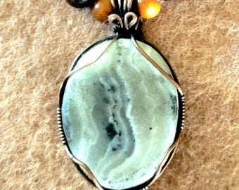 Silver lace onyx pendant with carnelian, bloodstone, pyrite and bone