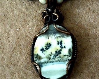 Silver lace onyx pendant with shell and seed