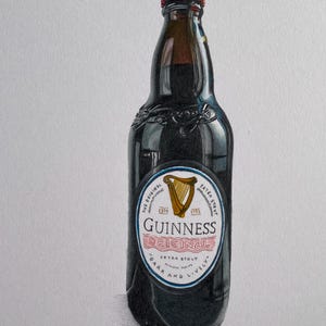 May include: A dark brown Guinness Original stout beer bottle with a red cap. The label features a gold harp and the words "Guinness Original Extra Stout". The text "Dark and Lively" is also visible.