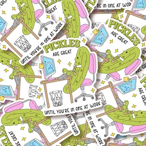 May include: A collection of stickers featuring a cartoon pickle character at a desk with a computer. The stickers have the text "Pickles Are Great" and "Until You're In One At Work". The stickers are white with a yellow star border.