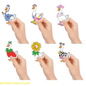 May include: Six different goose stickers with various outfits. The goose stickers are white with different colored outfits. The outfits include a strawberry, a sunflower, a cow, a nurse, a roller skater, and a pink cowboy hat.