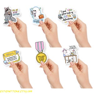 May include: A collection of six stickers with humorous office-themed designs. The stickers feature illustrations of a raccoon, a ghost, and other characters, along with text like "I'll be in my office" and "I find your lack of data disturbing."