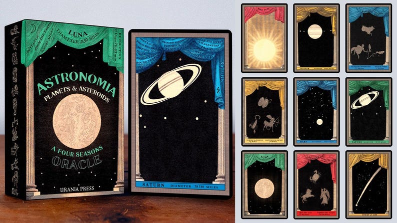 May include: A deck of oracle cards with a black background and gold accents. The cards feature illustrations of planets and celestial bodies. The box features the title "Astronomia Planets & Asteroids A Four Seasons Oracle" and the publisher "Urania Press".