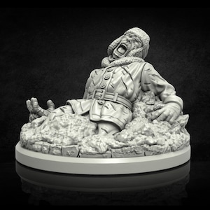 May include: A monochrome figurine depicting a person in a winter coat and fur hat, appearing to sink into snow. The figure's mouth is open, as if screaming, and it rests on a circular base. The sculpture is highly detailed.