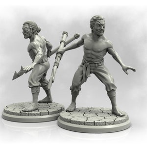 May include: Two grey painted miniature figures of men with beards, one holding a spear and the other holding a staff. The figures are standing on round bases.