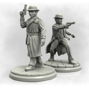 May include: Two grey painted miniature figures of men wearing trench coats and hats, one holding a gun in his right hand and the other holding a gun in his left hand. The figures are standing on round bases.