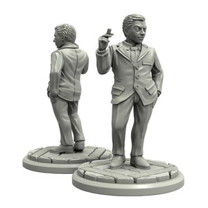 May include: A gray painted miniature figurine of a man wearing a suit and tie. The figurine is standing on a gray base with a cobblestone design.