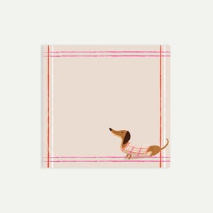 May include: A cream-coloured notepad with a red and pink border. A cartoon dachshund wearing a pink and white striped sweater is in the lower right corner. The notepad is blank, ready for notes.