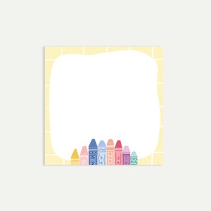 May include: A yellow card with a white space in the middle and a border of yellow squares. The white space has a wavy edge. At the bottom of the card are a row of colorful crayons.