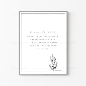 May include: Black and white printable wall art featuring a quote from Proverbs 14:4, "Where there are no oxen, the manger is clean, but abundant crops come by the strength of the ox."