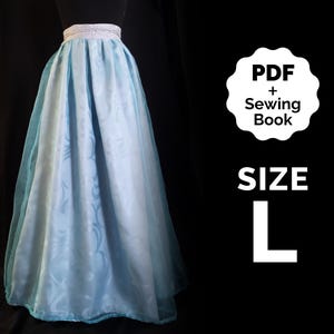 May include: A light blue maxi skirt with a white waistband. The skirt has a subtle pattern and is made of a sheer fabric. The image includes the text "PDF + Sewing Book" and "SIZE L".