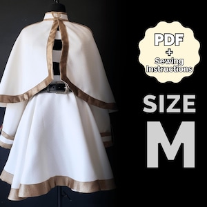 Puede incluir: Vestido blanco con ribete dorado y una capa a juego. El vestido tiene un corpiño ajustado y una falda completa. La capa tiene un cuello alto y una forma amplia y fluida. El vestido y la capa están hechos de una tela suave y fluida. La imagen también incluye el texto "PDF + Instrucciones de costura" y "TALLA M".