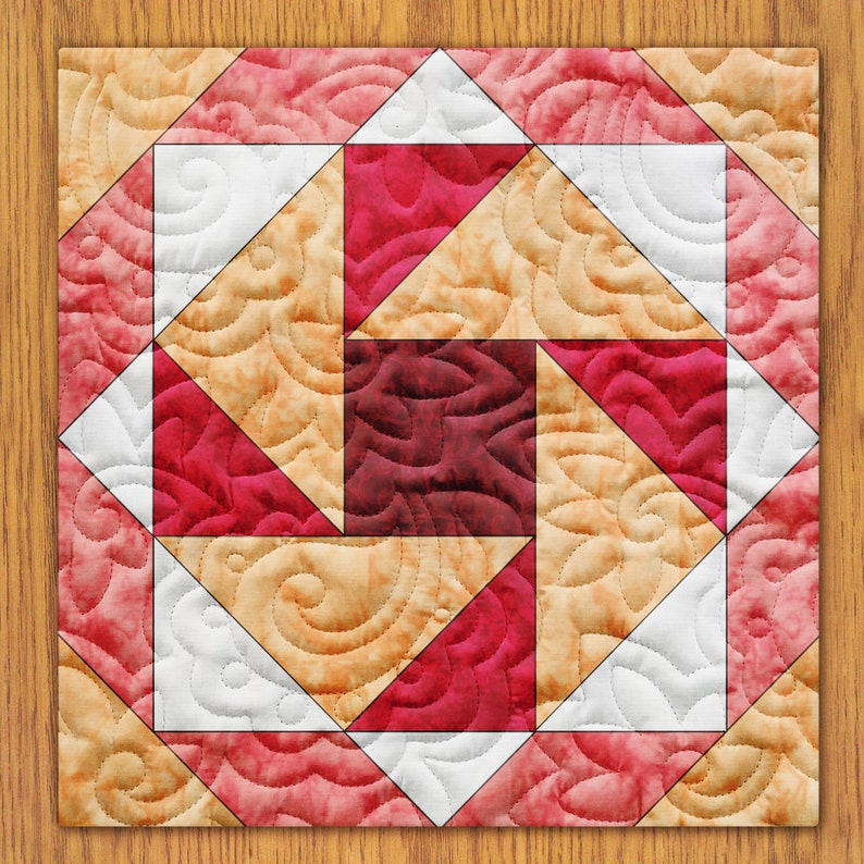 May include: A quilt block with a geometric pattern of red, white, and beige triangles. The fabric has a swirl pattern.