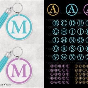 May include: Two keychains with a round, white background and a single letter in a larger font. The top keychain has a turquoise blue circle with the letter "M" in white. The bottom keychain has a purple circle with the letter "M" in white. Both keychains have a silver key ring and a turquoise blue tassel. The image also shows a grid of letters A through Z in different colors and styles.