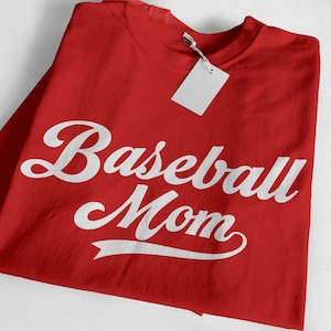 May include: Red t-shirt with white text that says "Baseball Mom" in a retro font.