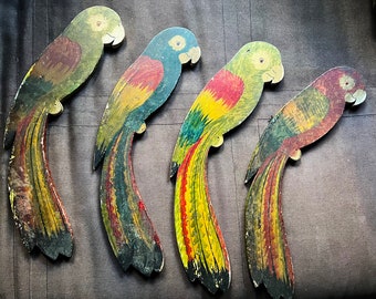 Old garage find.  Wood, hand painted vintage parrots. Two sided.  Great patina.
