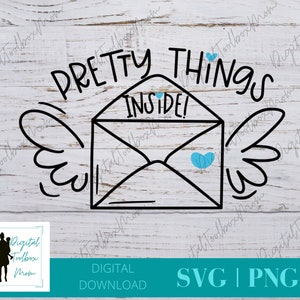 May include: A black and white graphic of an envelope with wings and the text "PRETTY THINGS INSIDE!". Two blue hearts are on the envelope. The image is on a white wood background. The words "DIGITAL DOWNLOAD" and "SVG | PNG" are also present.