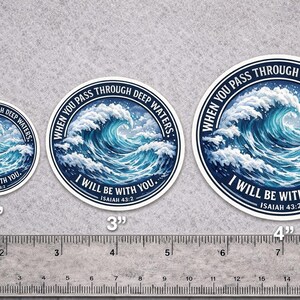 May include: Three round stickers with a blue and white wave design. The stickers are 2, 3, and 4 inches in diameter. Each sticker has the text "WHEN YOU PASS THROUGH DEEP WATERS, I WILL BE WITH YOU. ISAIAH 43:2."