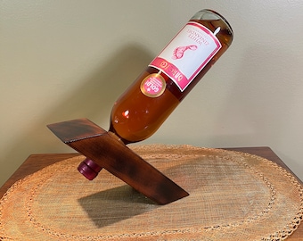 Balancing wine bottle display