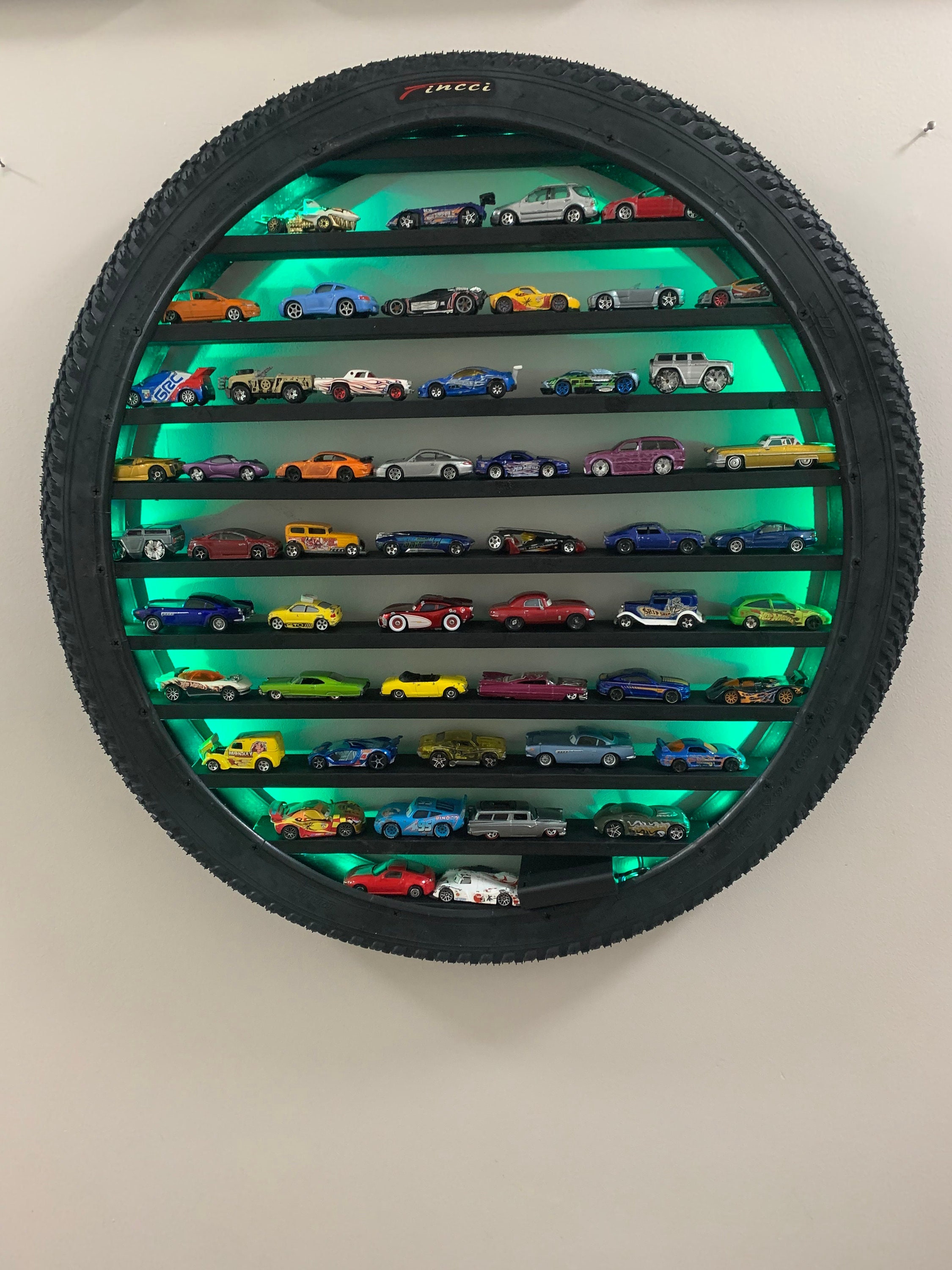Got a HW display for Christmas, decided to personalize it with some LED  tape lights. Just put some cars in, (also I'm new to this sub) lmk what you  think! : r/HotWheels