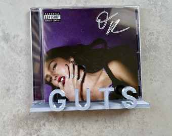 CD wall display for GUTS | Customized CD wall holder
