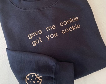 New Girl Sweatshirt: 'Gave Me Cookie, Got You Cookie' with design on sleeve