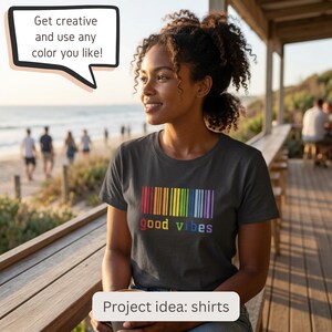 May include: A dark gray short-sleeve t-shirt featuring a colorful rainbow barcode graphic above the text "good vibes". A speech bubble in the upper left corner contains the text "Get creative and use any color you like!" and a lower label reads "Project idea: shirts".