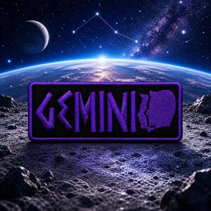 May include: A black patch featuring the word "GEMINI" in purple embroidery, accompanied by a purple Gemini symbol. The patch is set against a backdrop of a planet, moon, stars, and the Milky Way.