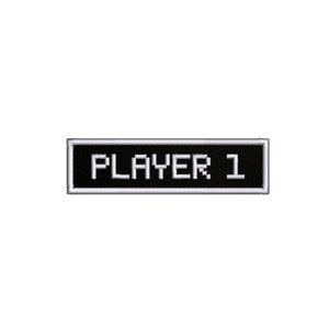 May include: A black rectangular patch with a white border and the text "PLAYER 1" in white pixelated letters.