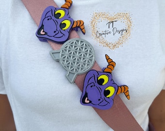 The Dinosaur Figment Bag and Belt Charm.