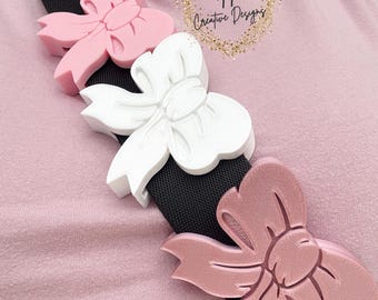 Bow Belt and Bag Charm.
