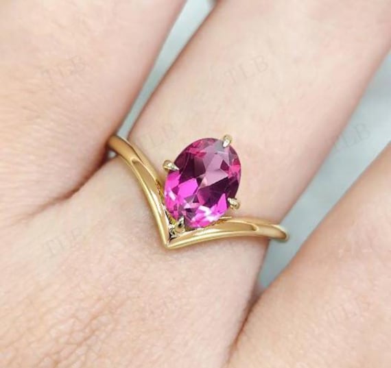 V字カーブのピンクトルマリンエンゲージリング、オーバルカットの