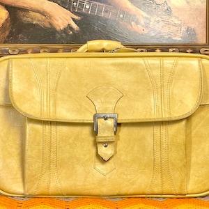 1975 American Tourister Suitcase by American Luggage Works, Inc.