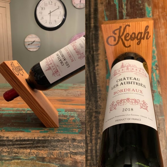Zero gravity wine bottle holder outlet