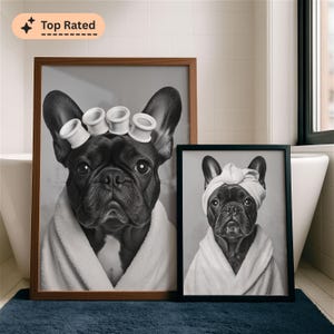 Bathroom mock‑up: two framed black‑and‑white French bulldog spa portraits lean against a bathtub; large print shows dog in robe with hair rollers, smaller print shows same dog in towel turban. “Top Rated” badge in corner.