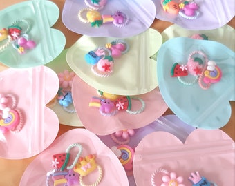 Recuerdos para fiestas de cumpleaños infantiles: gomas para el pelo