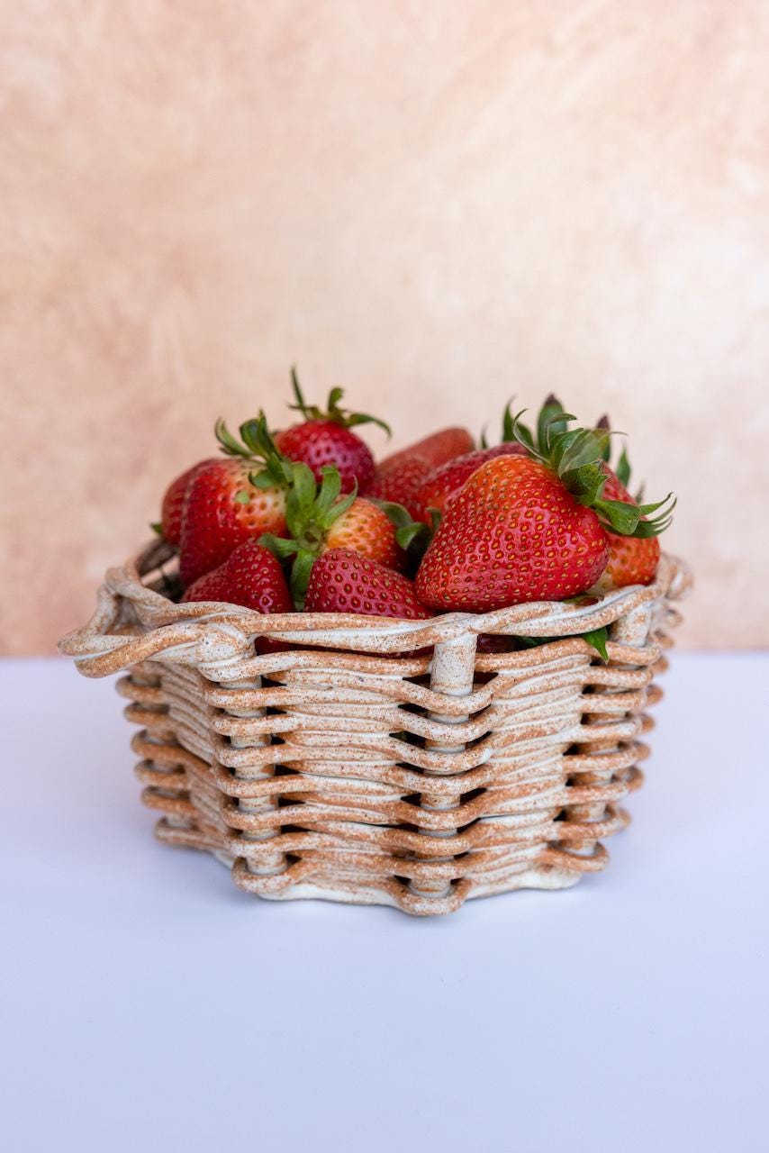Panier en céramique tissée mouchetée d'orange