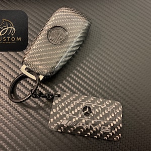 Echte Carbon-Faser-Schlüssel-Fob-Abdeckung Schlüsselring-Paket für Mercedes G63 W464 Exclusive Pack