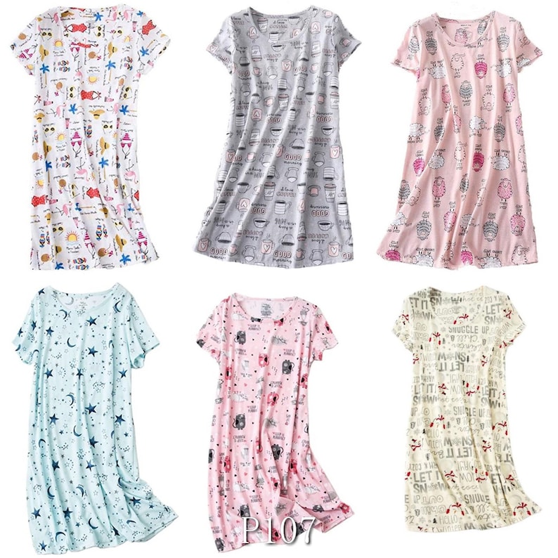 May include: Six short-sleeved nightgowns in various colors and patterns. The patterns include cartoon characters, coffee cups, sheep, celestial designs, and text. The nightgowns are displayed on a white background.