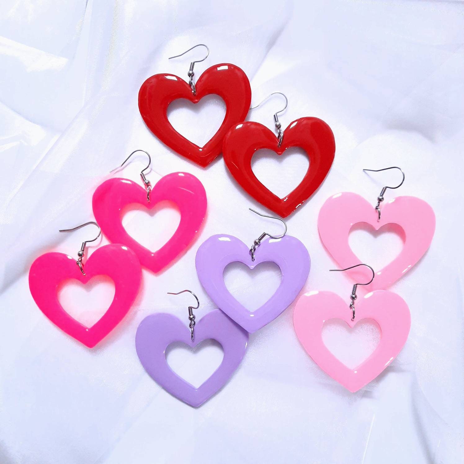 Plastic heart best sale earrings