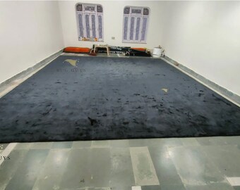 Alfombra de seda tencel negra hecha a mano: suave y brillante.