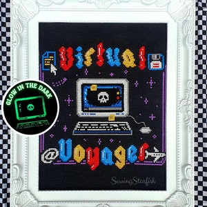 May include: Cross-stitch art in a white ornate frame. The black background features the words "Virtual Voyager" in colorful pixelated text, a computer with a skull, and a glow-in-the-dark effect. The artwork is signed "SewingStarfish".