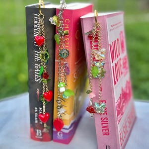 whimsical beaded bookmark with charms. perfect gift for book lovers!