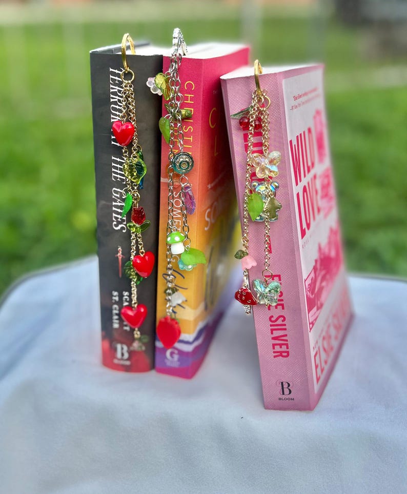 whimsical beaded bookmark with charms. perfect gift for book lovers!