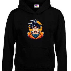 May include: Black hooded sweatshirt featuring a colorful graphic of a character with spiky black hair, set against an orange circle. The character has blue and orange clothing. The sweatshirt has a front pocket and a drawstring hood.