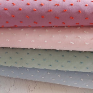 Cotton fabric with polka dot structure in pastel colors